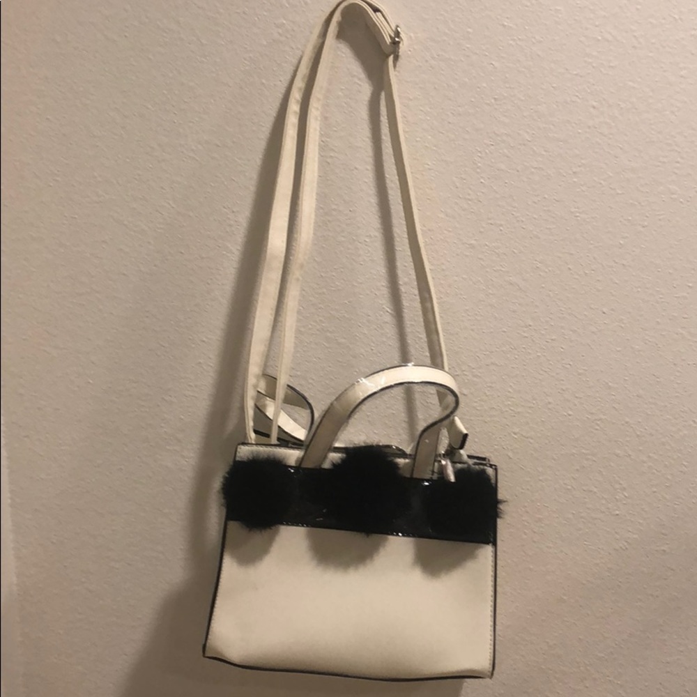 White and black poof bag in a small size!
